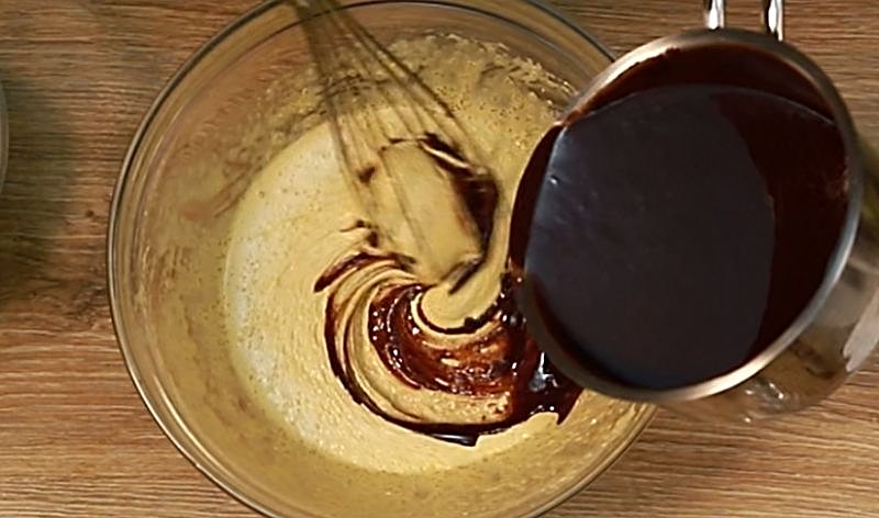 Whisk in the chocolate-butter mixture